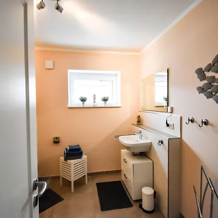 Tim's Huus Strandbrise Гельтинг